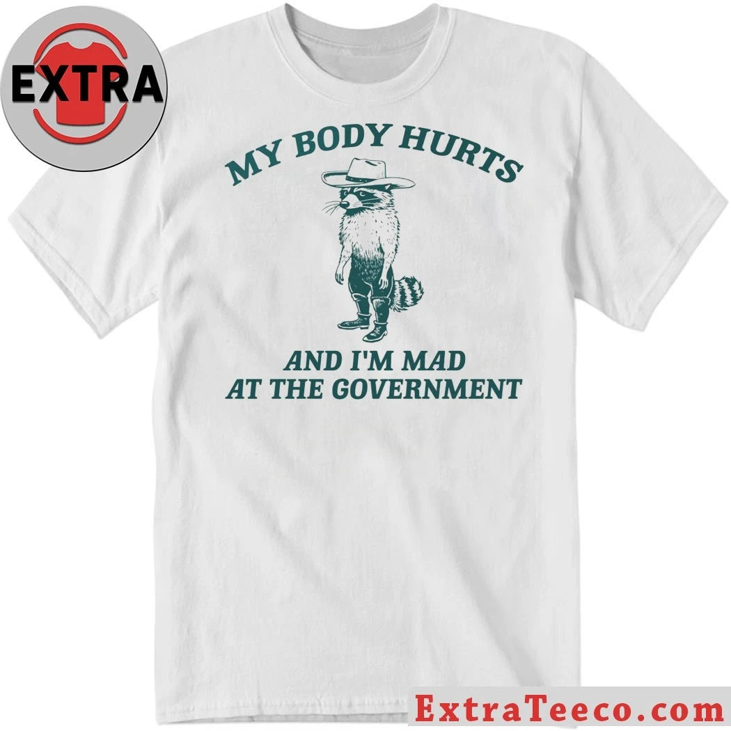 Racoon Wearing Cowboy Hat and Boots My Body Hurts And I’m Mad At The Government 2026 T-Shirt