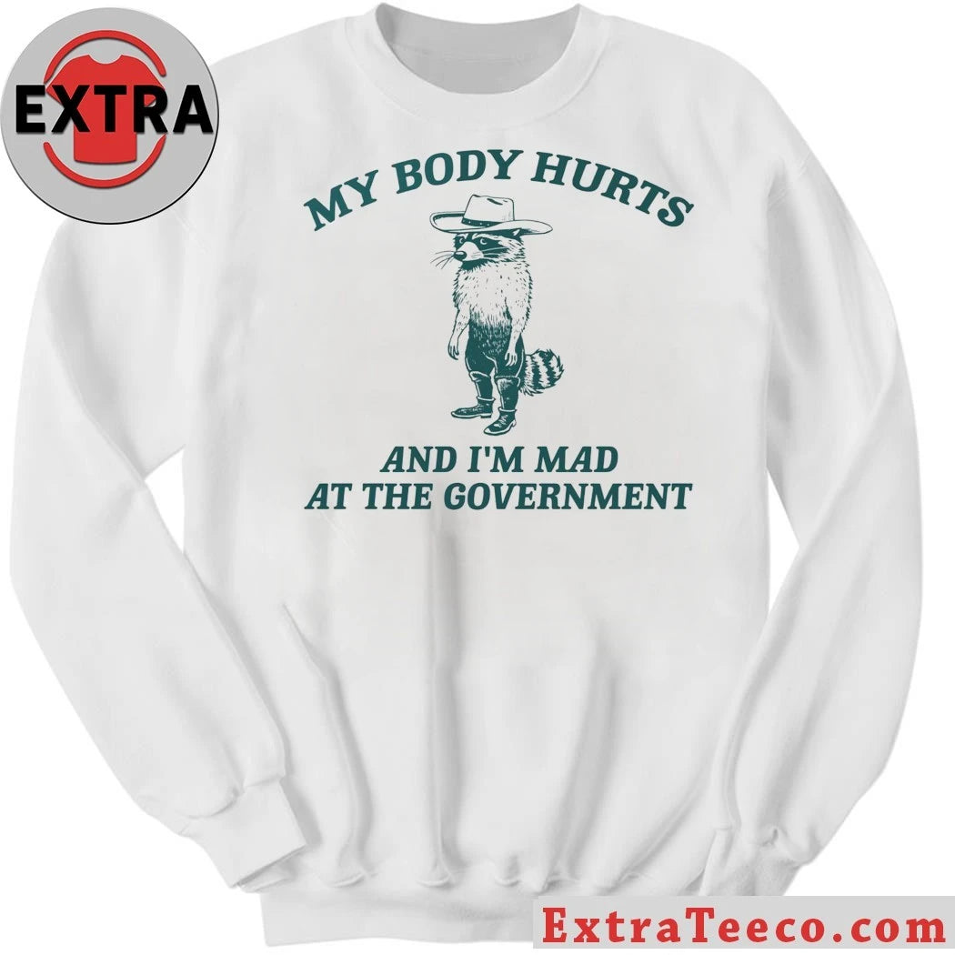 Racoon Wearing Cowboy Hat and Boots My Body Hurts And I’m Mad At The Government 2026 T-Shirt